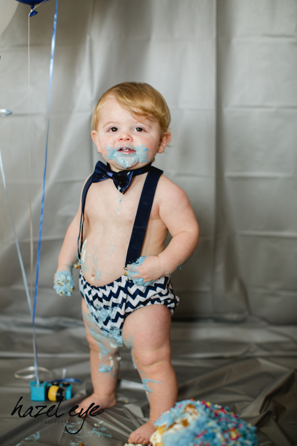 bloomfield montclair baby photography first birthday cake smash suspenders bowtie balloons Best New Jersey Photographer, Best New Jersey Photographers, Best New Jersey Photography, Best New Jersey Wedding Photographer, Best New Jersey Wedding Photographers, Best New Jersey Wedding Photography, Best NJ Photographer, Best NJ Photography, Best NJ Wedding Photographer, Best NJ Wedding Photographers, Hazel Eye Photography, New Jersey Photographers, new jersey photography, New Jersey Wedding, New Jersey Wedding Photographer, New Jersey Wedding Photographers, New Jersey Wedding Photography
